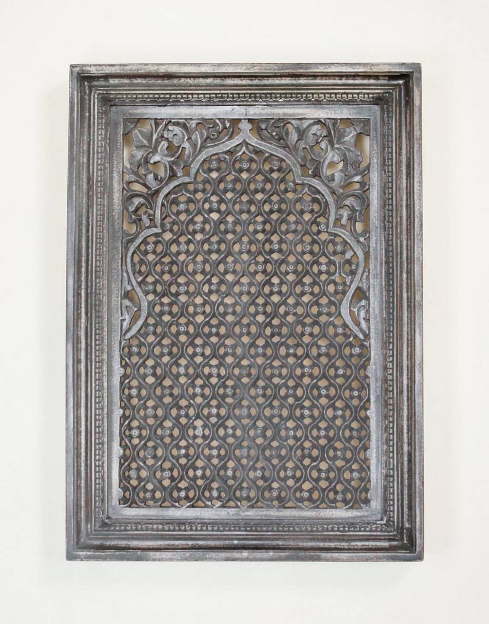 The panel's intricate detailing and bold black color will add a touch of sophistication to any room