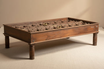 Haveli Door Coffee Table crafted from reclaimed wood, featuring an antique haveli door-inspired design with intricate hand-carved details and a rustic natural finish.