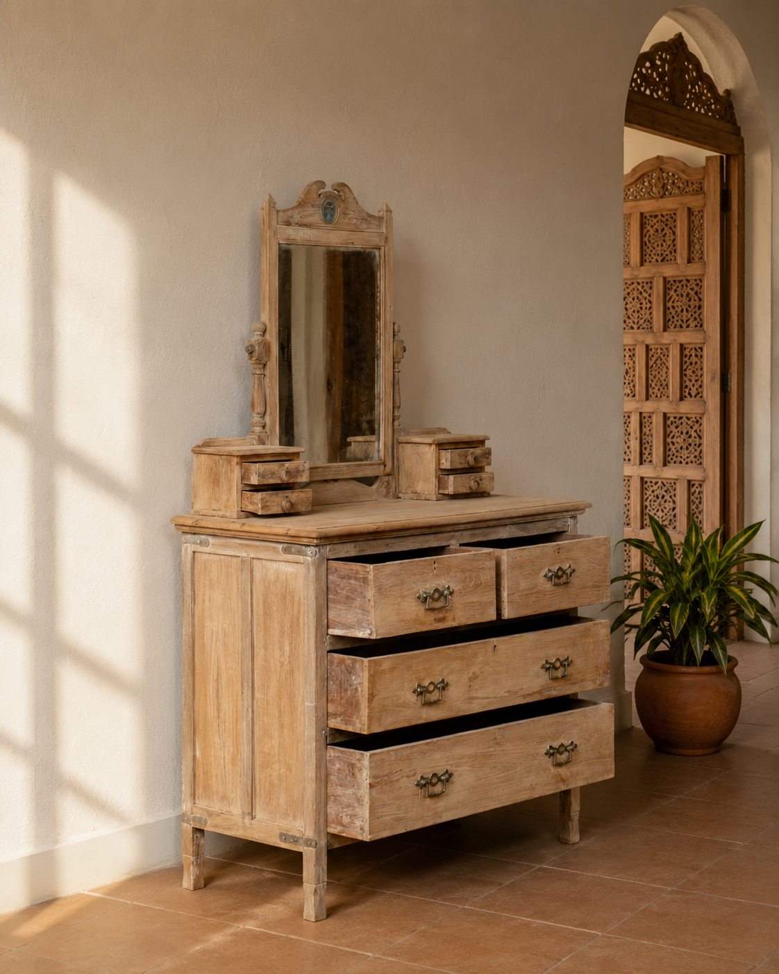 Two flanking trinket drawers on the dressing surface for jewellery and keepsakes