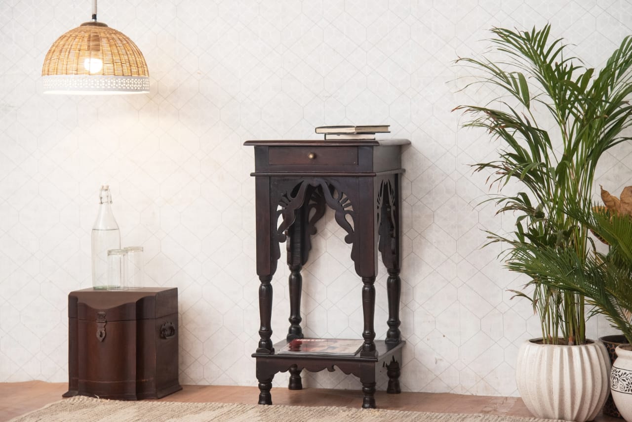  Whether used as a bedside table, accent table, or end table, this vintage-style wooden furniture is a timeless addition to your home.