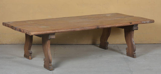 Wooden table with a rustic design 