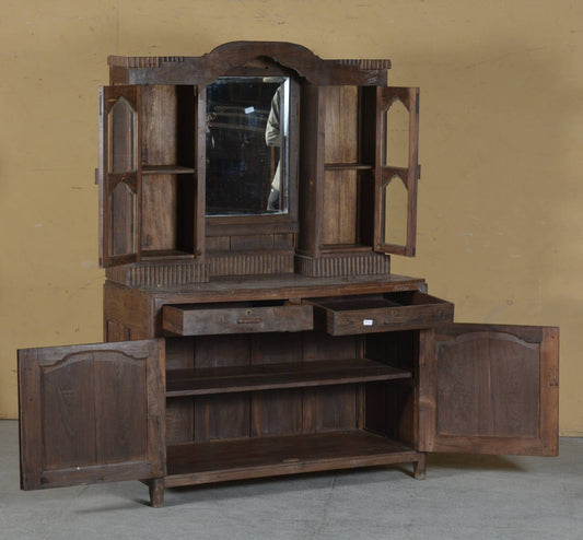 Wooden wardrobe with open doors on a plain background