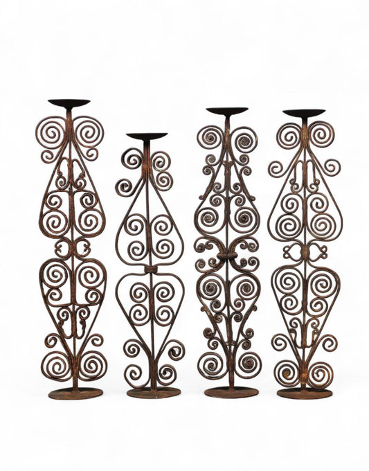  Made from durable wrought iron, this versatile piece blends rustic elegance with functional design. 