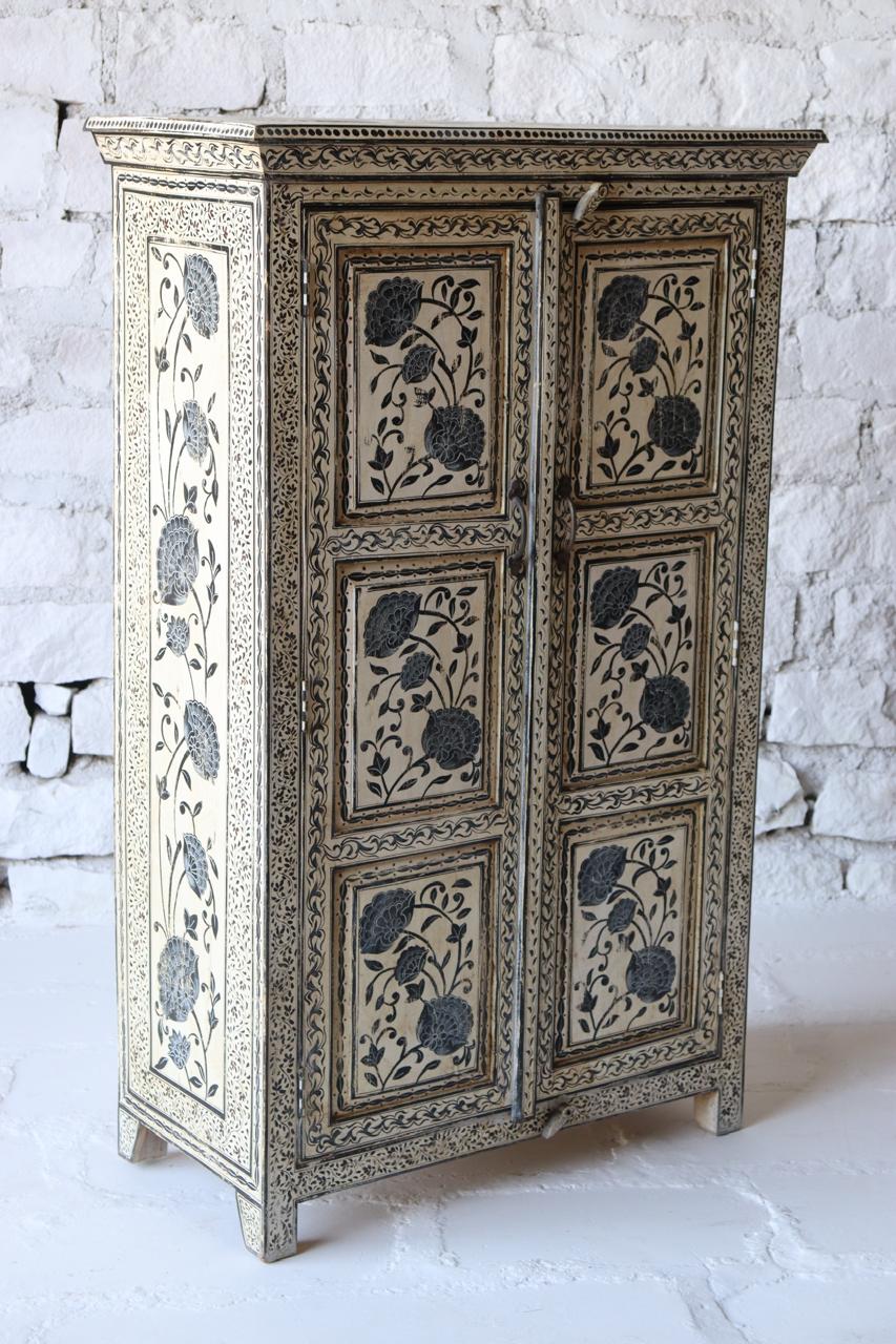Featuring intricate floral carvings and traditional Indian motifs, this artisan cabinet blends heritage craftsmanship with functional design.&nbsp;