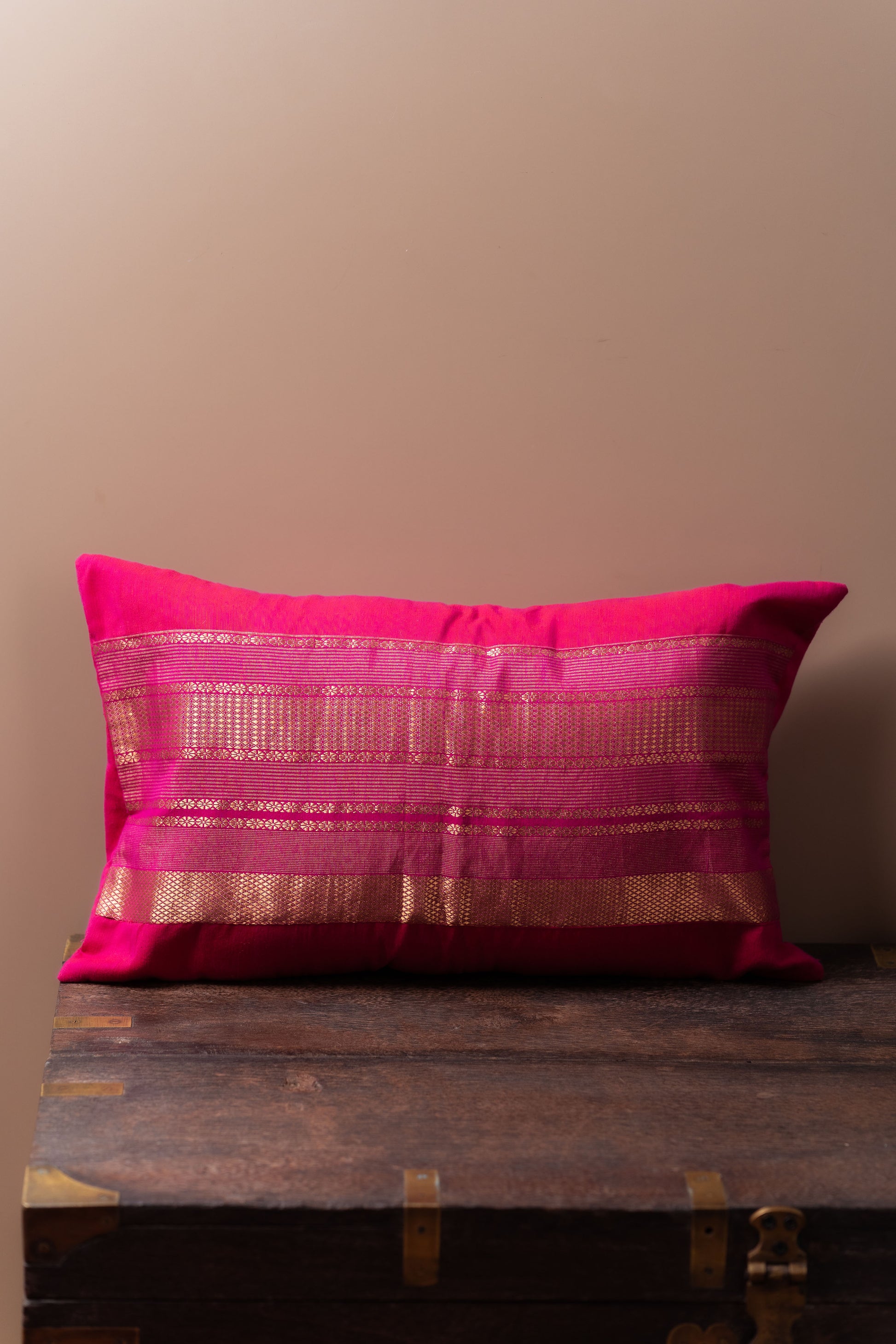 Magenta and gold lumbar cushion cover
Luxurious lumbar pillow
Sophisticated home decor
Broad border cushion cover
Rich magenta fabric
Elegant golden border
Statement piece for sofa
High-quality cushion cover
Comfortable lumbar support
Vibrant colors decor
Chic design cushion
Modern and traditional interiors
Elevate home aesthetics
Stylish accent chair cushion
Decorative lumbar pillow