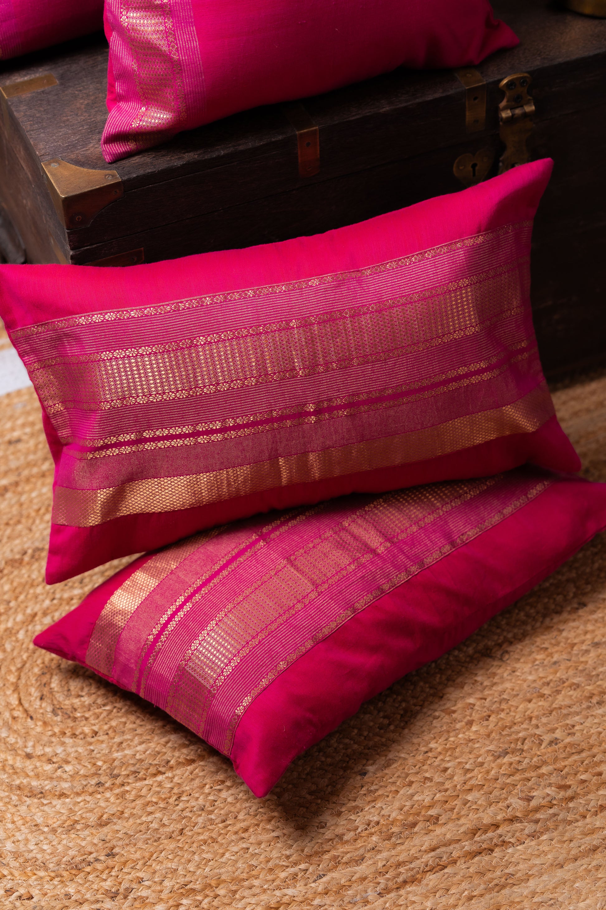 Magenta and gold lumbar cushion cover
Luxurious lumbar pillow
Sophisticated home decor
Broad border cushion cover
Rich magenta fabric
Elegant golden border
Statement piece for sofa
High-quality cushion cover
Comfortable lumbar support
Vibrant colors decor
Chic design cushion
Modern and traditional interiors
Elevate home aesthetics
Stylish accent chair cushion
Decorative lumbar pillow