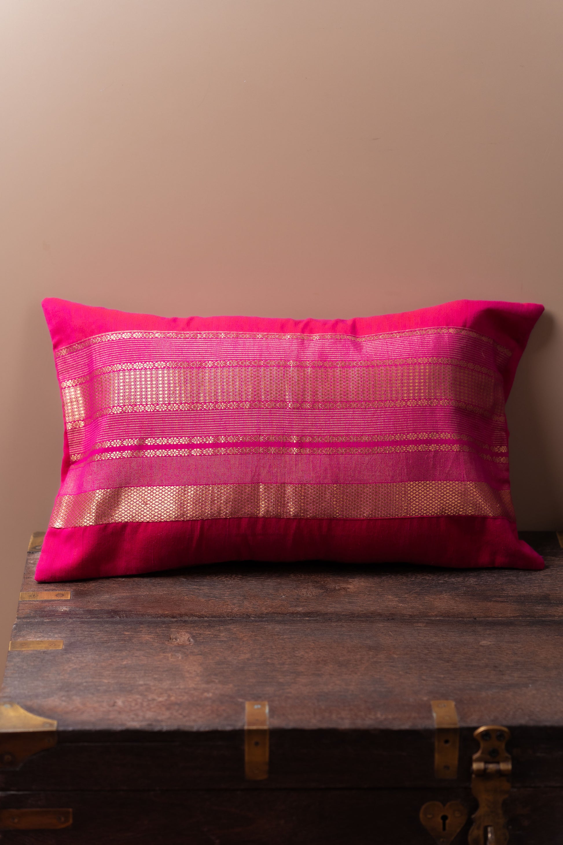 Magenta and gold lumbar cushion cover
Luxurious lumbar pillow
Sophisticated home decor
Broad border cushion cover
Rich magenta fabric
Elegant golden border
Statement piece for sofa
High-quality cushion cover
Comfortable lumbar support
Vibrant colors decor
Chic design cushion
Modern and traditional interiors
Elevate home aesthetics
Stylish accent chair cushion
Decorative lumbar pillow