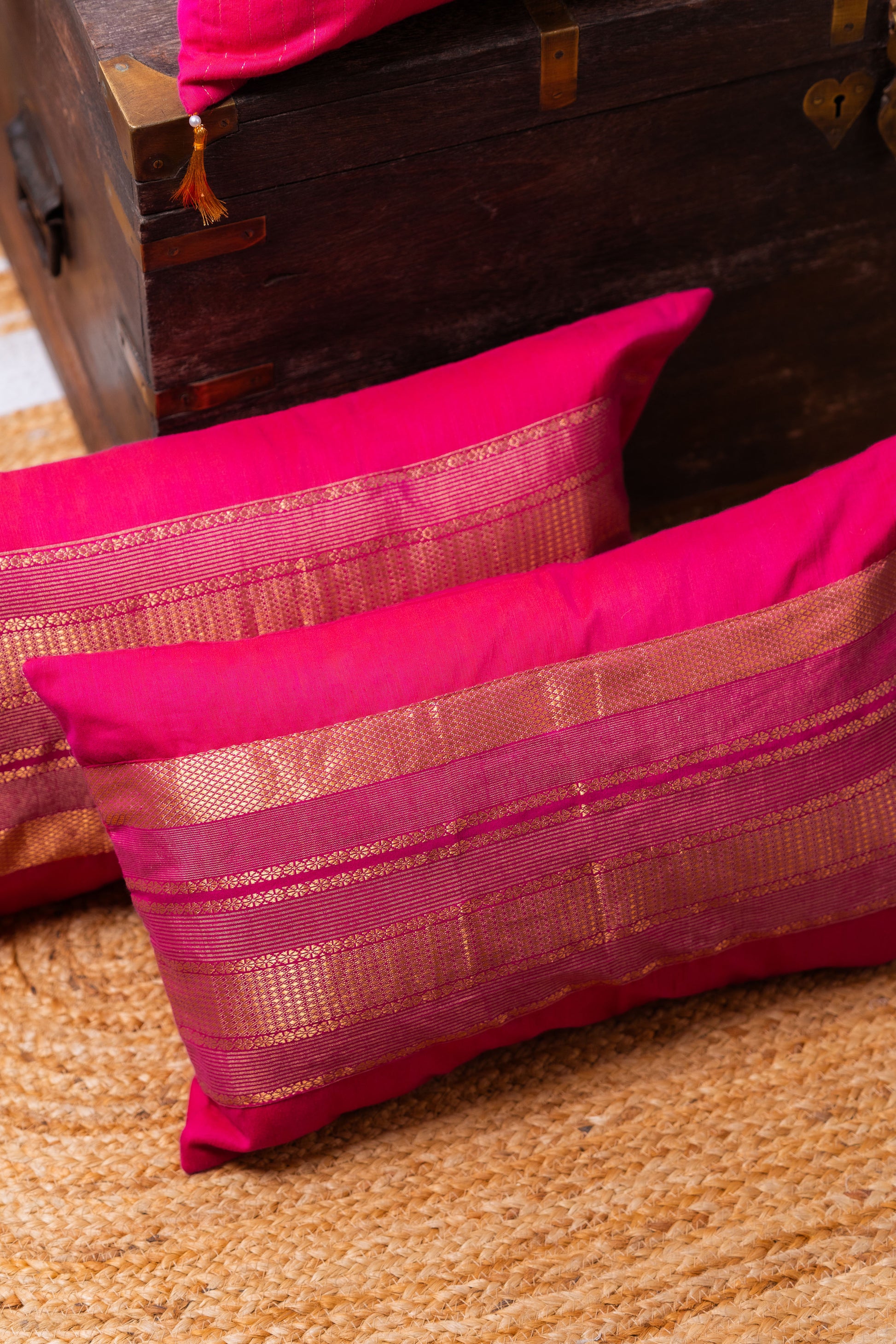 Magenta and gold lumbar cushion cover
Luxurious lumbar pillow
Sophisticated home decor
Broad border cushion cover
Rich magenta fabric
Elegant golden border
Statement piece for sofa
High-quality cushion cover
Comfortable lumbar support
Vibrant colors decor
Chic design cushion
Modern and traditional interiors
Elevate home aesthetics
Stylish accent chair cushion
Decorative lumbar pillow