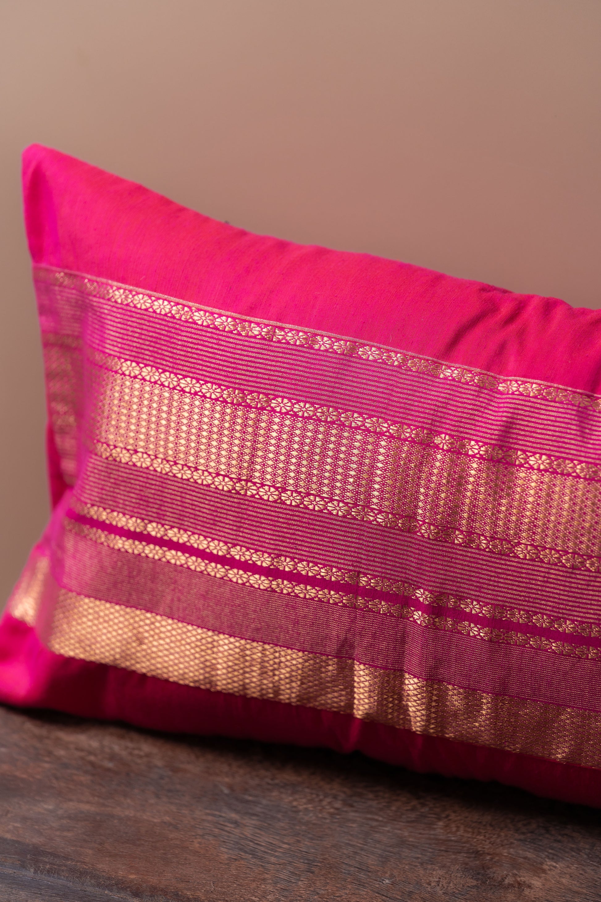 Magenta and gold lumbar cushion cover
Luxurious lumbar pillow
Sophisticated home decor
Broad border cushion cover
Rich magenta fabric
Elegant golden border
Statement piece for sofa
High-quality cushion cover
Comfortable lumbar support
Vibrant colors decor
Chic design cushion
Modern and traditional interiors
Elevate home aesthetics
Stylish accent chair cushion
Decorative lumbar pillow