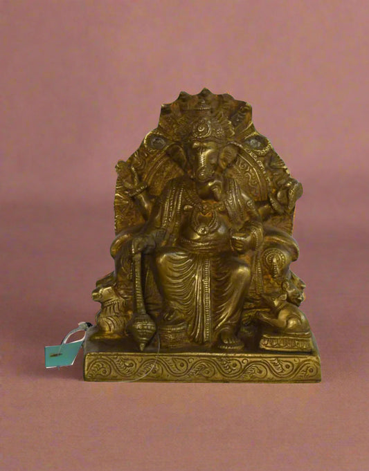 Add a touch of royalty and divine grace to your home with the Maharaja Ganesha – a beautifully handcrafted brass idol of Lord Ganesha seated on an ornate throne. 