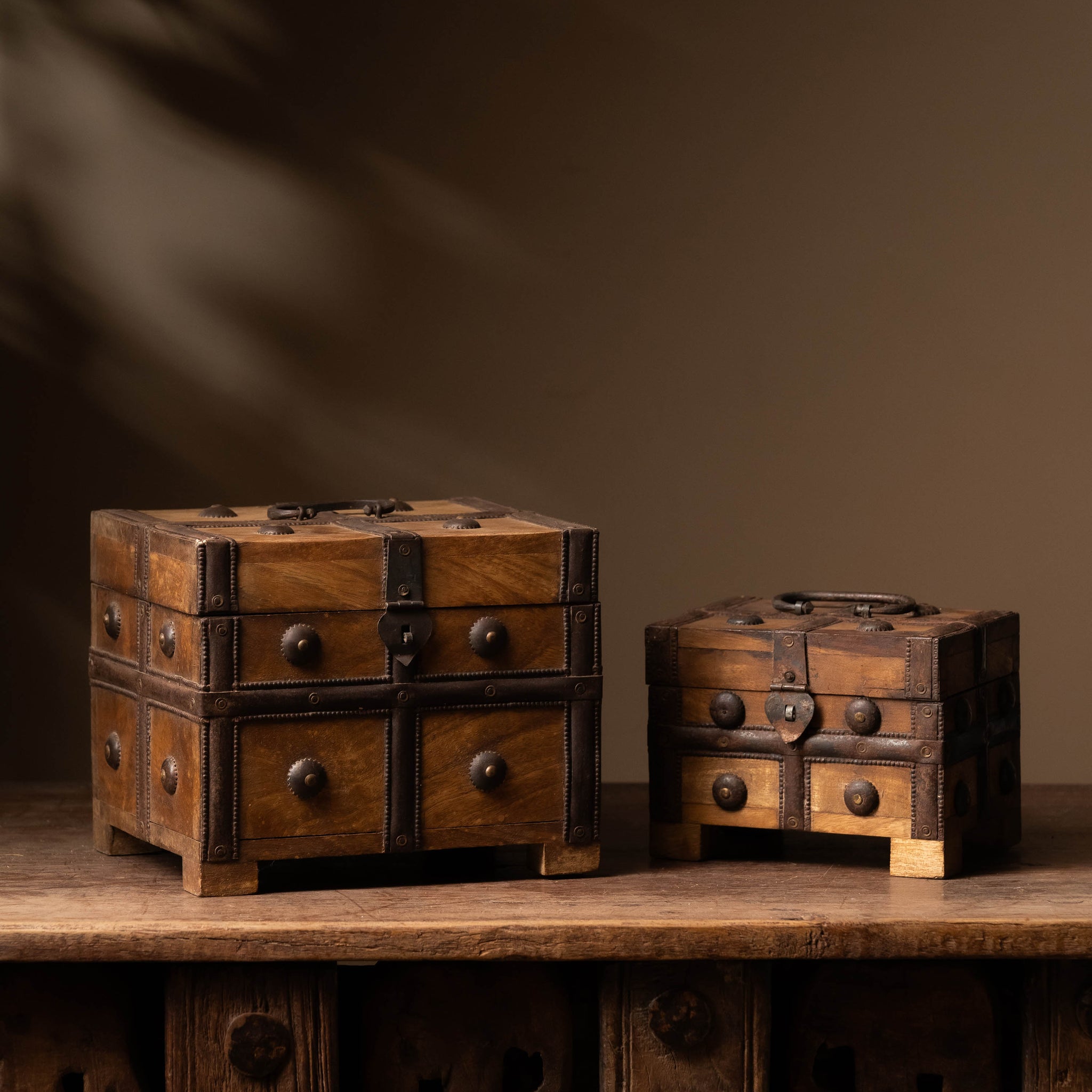 The Mango Charm Chest is a finely handcrafted wooden storage box, designed with traditional artistry and meticulous attention to detail. 