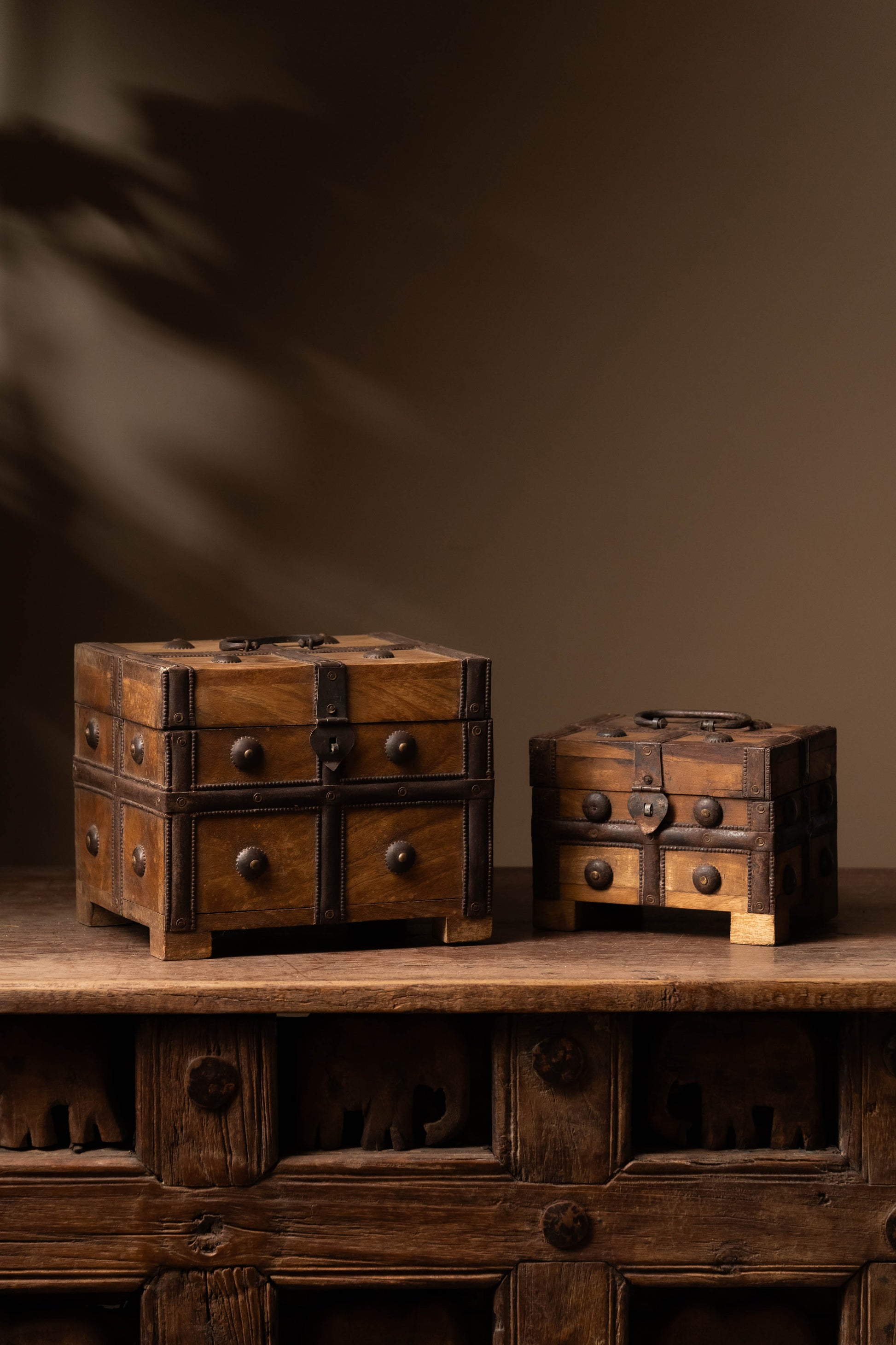 The Mango Charm Chest is a finely handcrafted wooden storage box, designed with traditional artistry and meticulous attention to detail. 