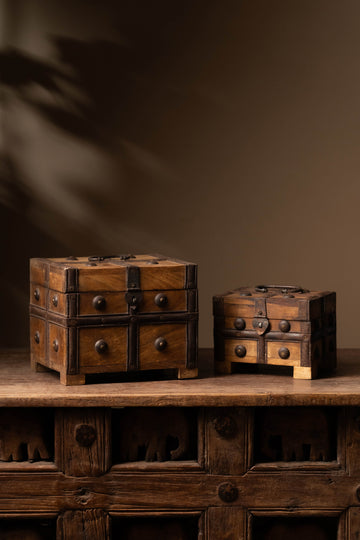 The Mango Charm Chest is a finely handcrafted wooden storage box, designed with traditional artistry and meticulous attention to detail. 