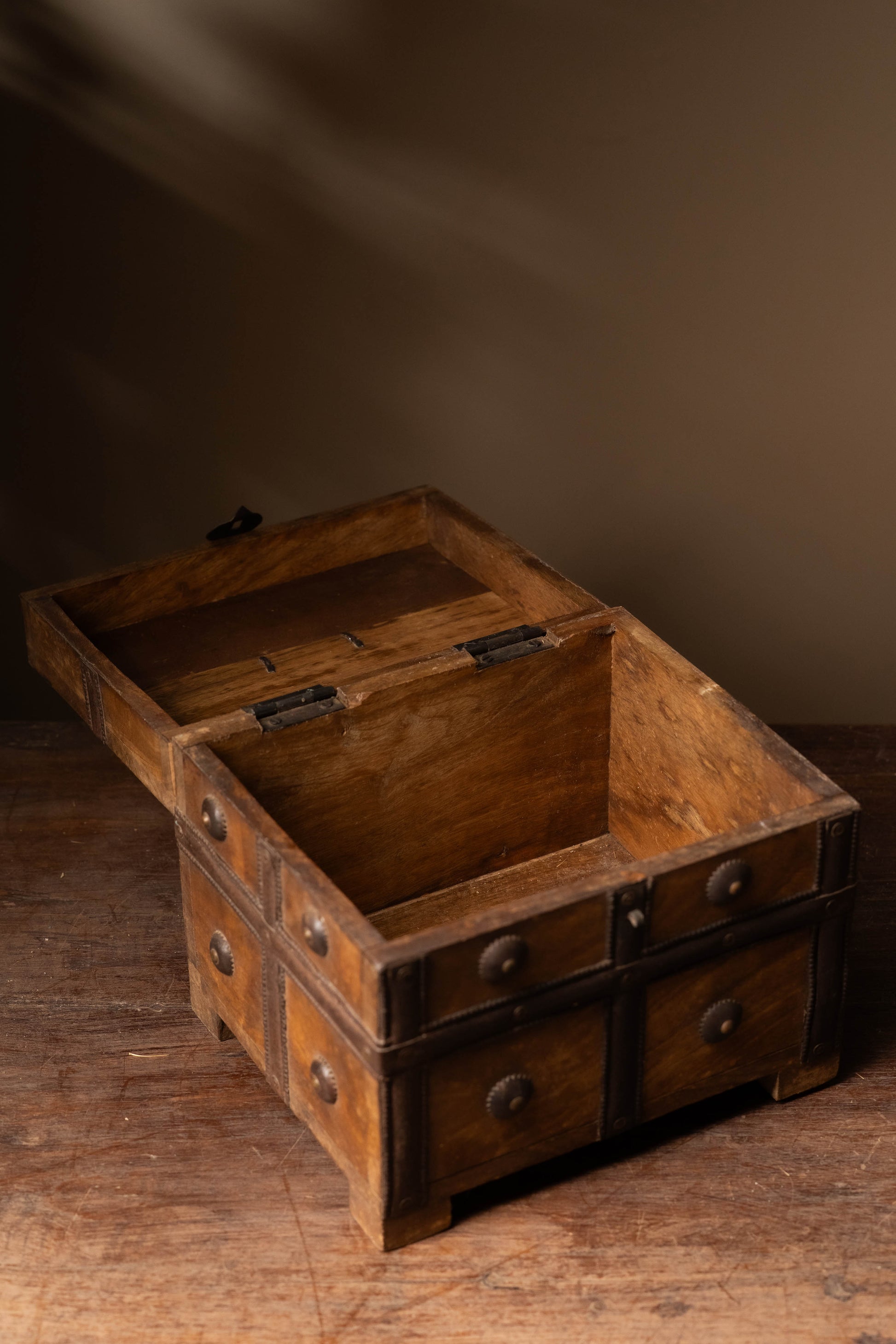 The Mango Charm Chest is not just a storage piece but a reflection of artisanal heritage and craftsmanship. Whether placed on a dresser, study table, or mantelpiece, it adds warmth and character to any space.
