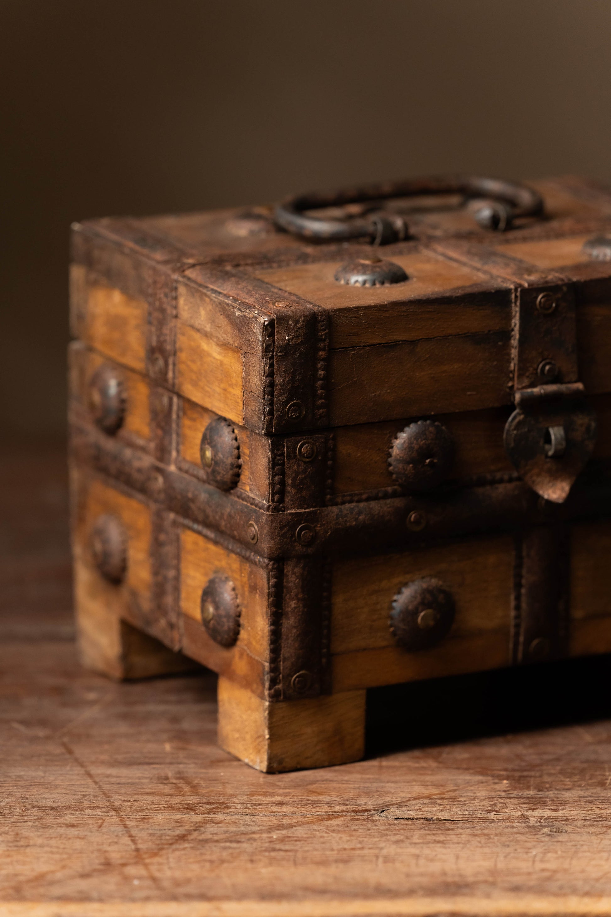 The Mango Charm Chest is a beautifully handcrafted wooden box made from premium mango wood, showcasing its rich grain patterns and warm, natural tones. 
