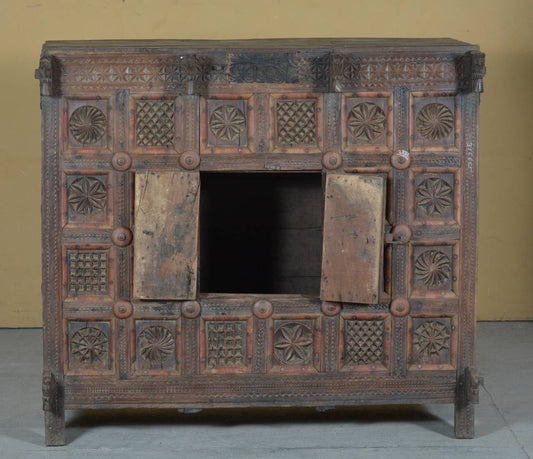 Hand-carved from solid teak wood, its ornate mandala-style motifs reflect centuries of folk artistry and traditional dowry culture.