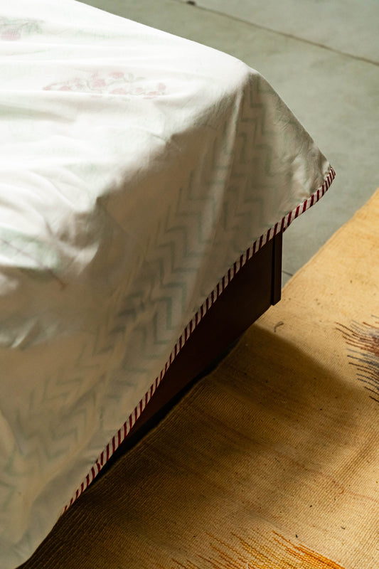 Our Gulnaar Dohar made of soft organic cotton is hand block printed with cheerful motifs. 