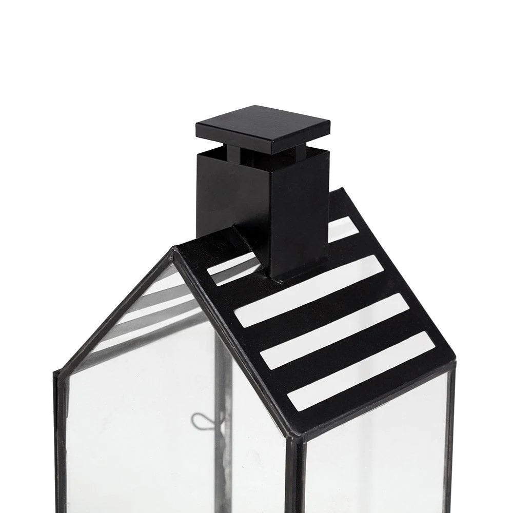 The Modern Lantern Glow Set of 2 brings a sophisticated, contemporary touch to your lighting decor. With sleek, geometric designs and a polished finish, these lanterns offer a perfect balance of style and functionality. 