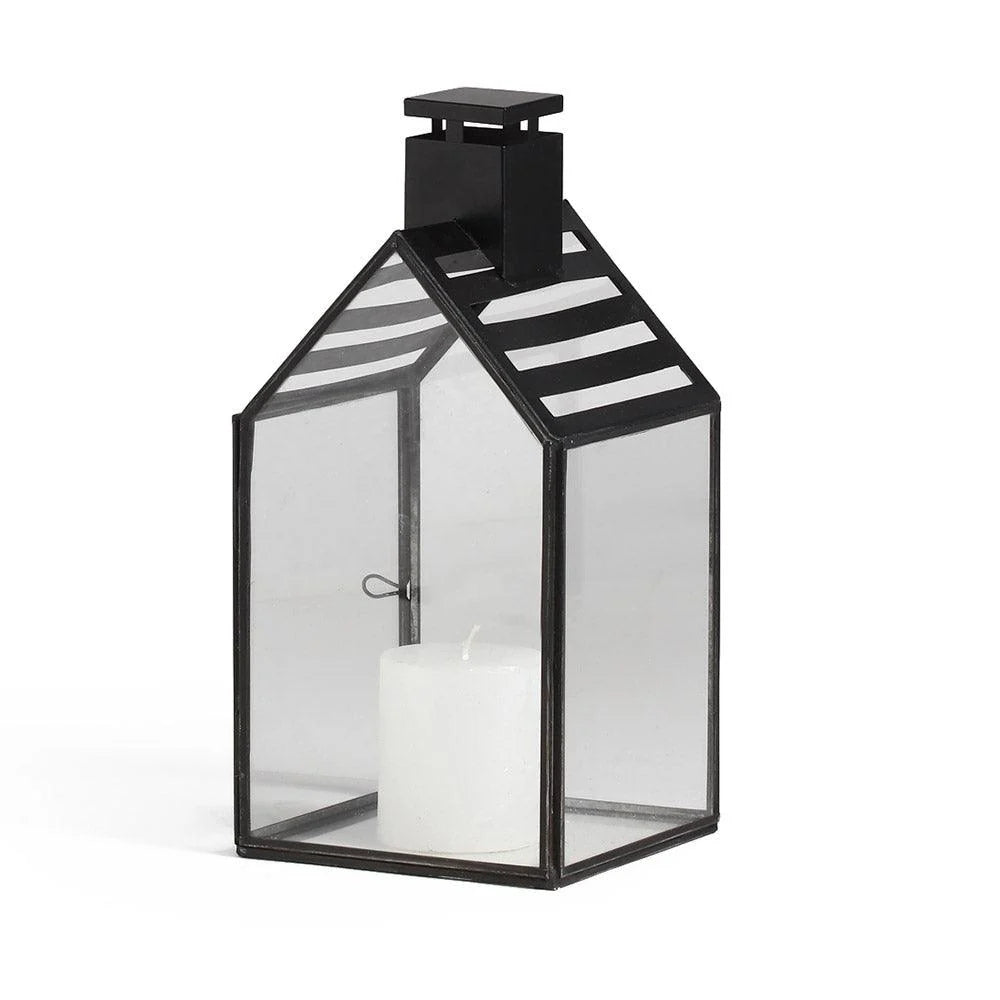 The Modern Lantern Glow Set of 2 brings a sophisticated, contemporary touch to your lighting decor. With sleek, geometric designs and a polished finish, these lanterns offer a perfect balance of style and functionality. 