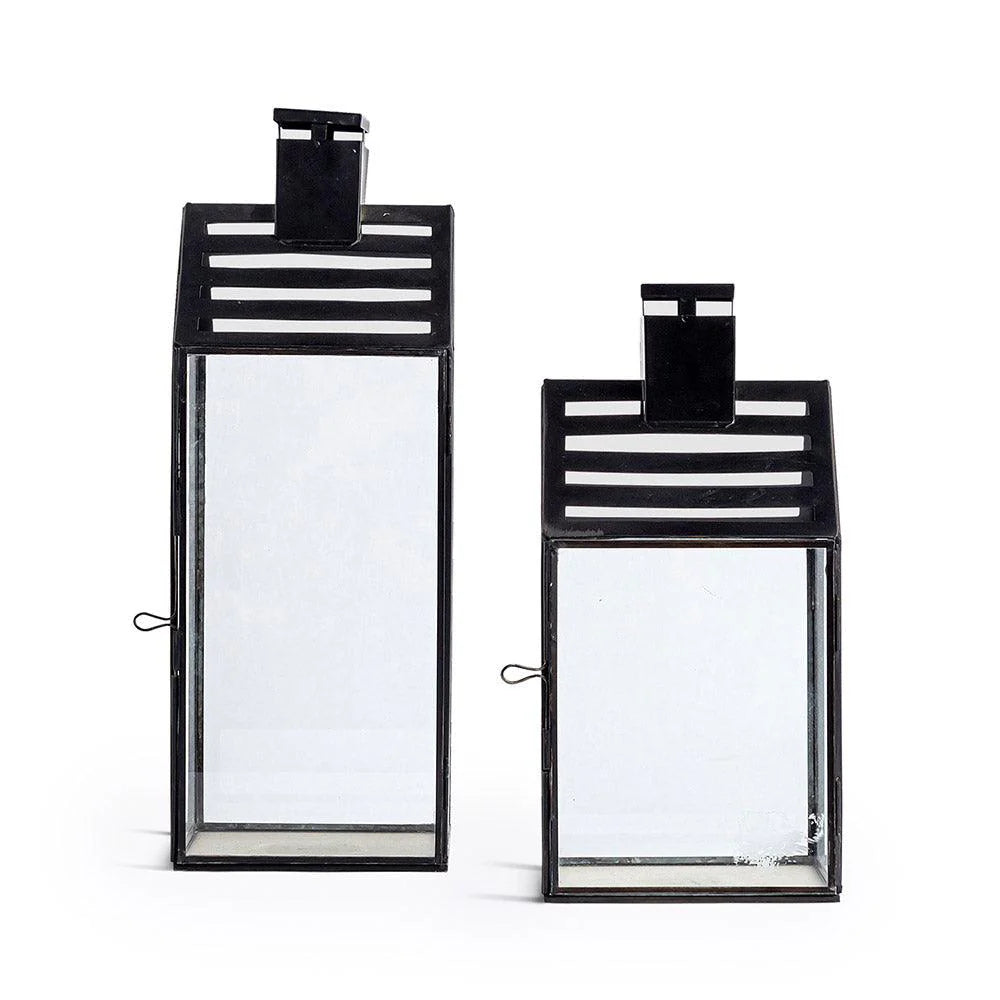 The Modern Lantern Glow Set of 2 brings a sophisticated, contemporary touch to your lighting decor. With sleek, geometric designs and a polished finish, these lanterns offer a perfect balance of style and functionality. 