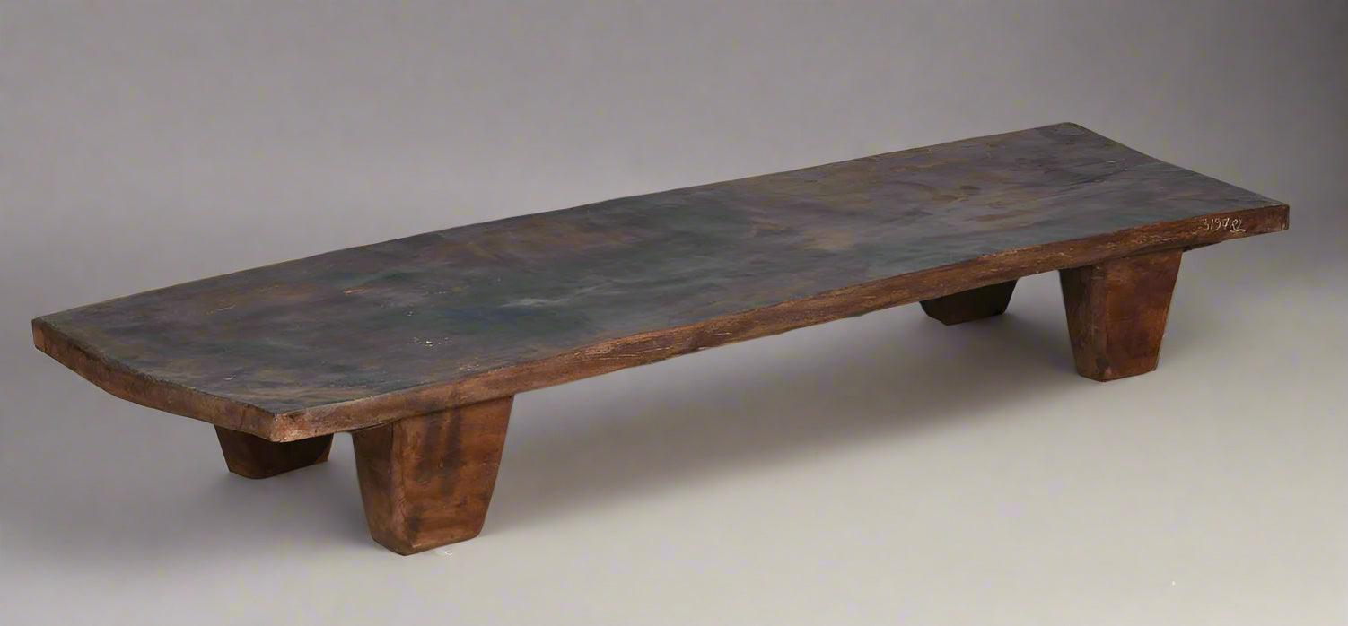 Wooden bench on a plain background