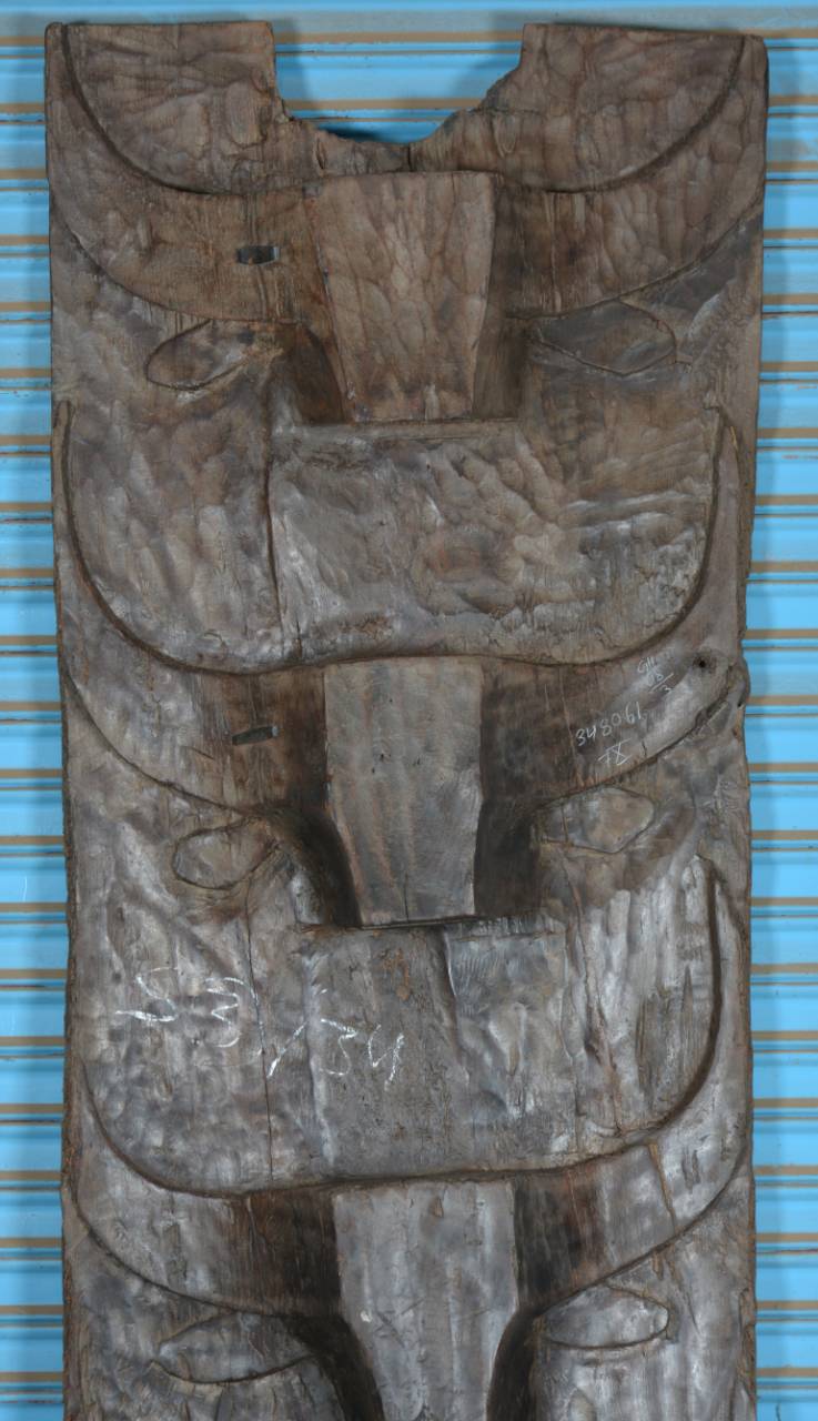 Wooden carvings on a blue background