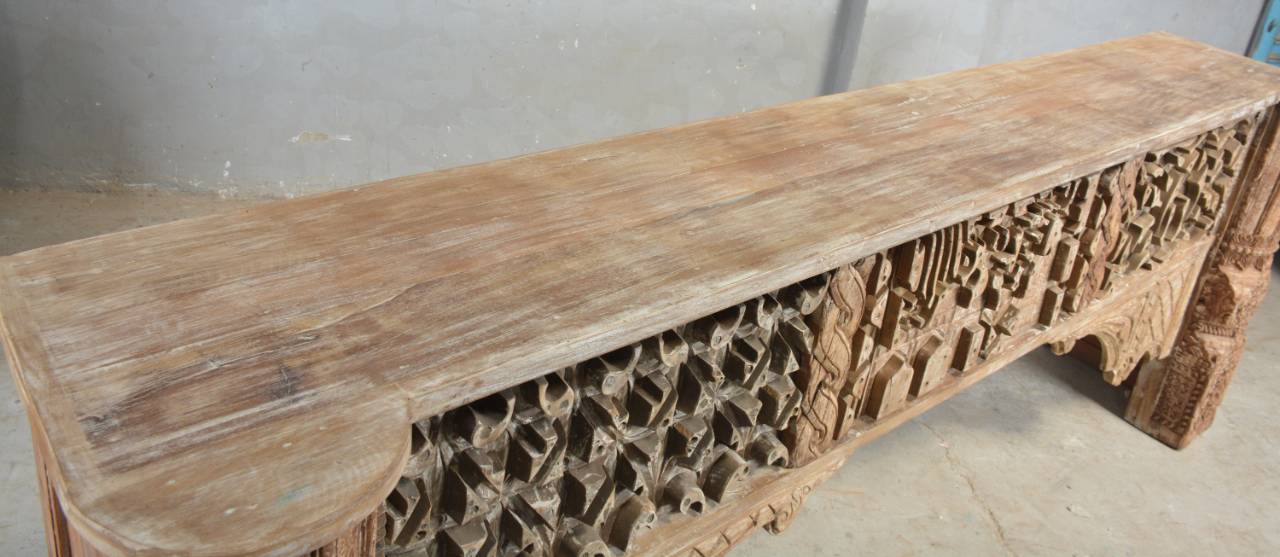 this statement piece features beautifully carved panels inspired by heritage architecture,