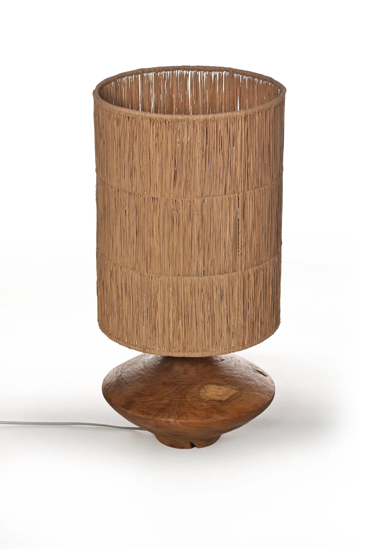 The Natural Aura Wooden Base Table Lamp exudes warmth and elegance with its earthy design and timeless appeal. Featuring a beautifully crafted wooden base, this lamp adds a touch of nature to any room. 