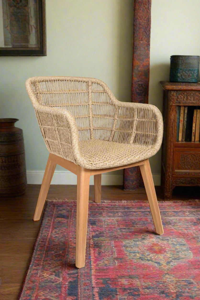 The Nature Weave Chair is a perfect blend of craftsmanship and elegance. Featuring a handwoven rattan seat and backrest, supported by solid teak wood legs, this chair exudes natural beauty and durability. 