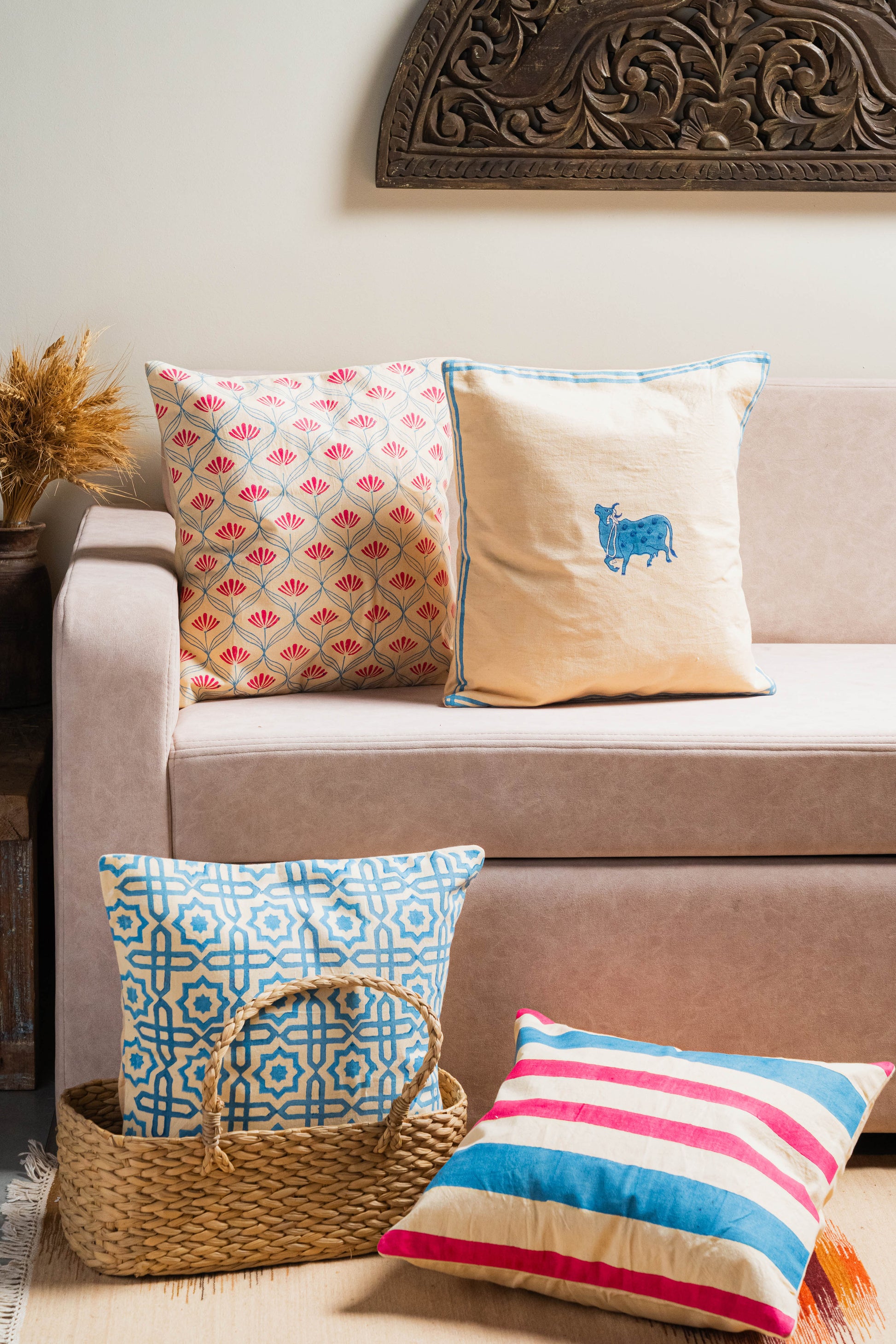 Handcrafted cotton cushion covers – floral, striped, geometric, and cow motif designs – perfect for modern and ethnic home decor.