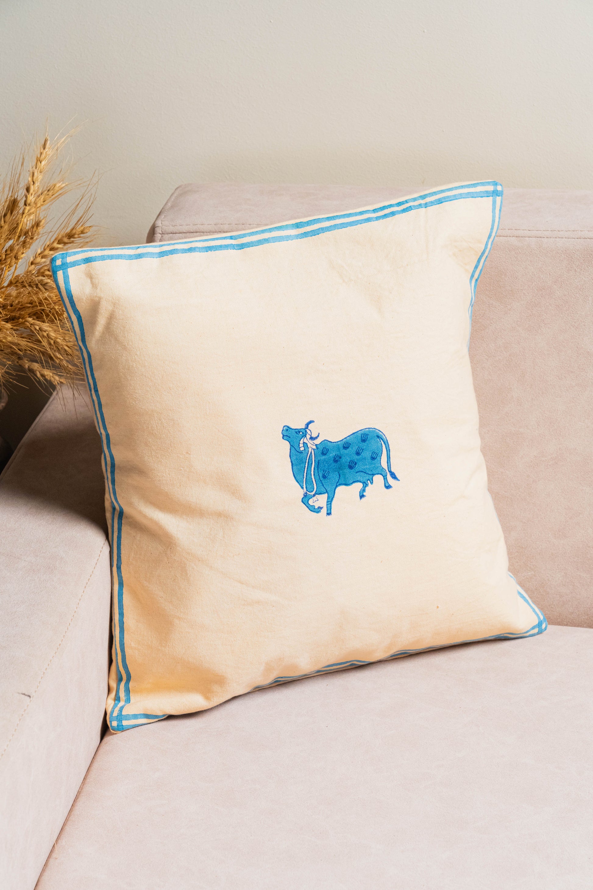 Handcrafted cotton cushion covers – floral, striped, geometric, and cow motif designs – perfect for modern and ethnic home decor.