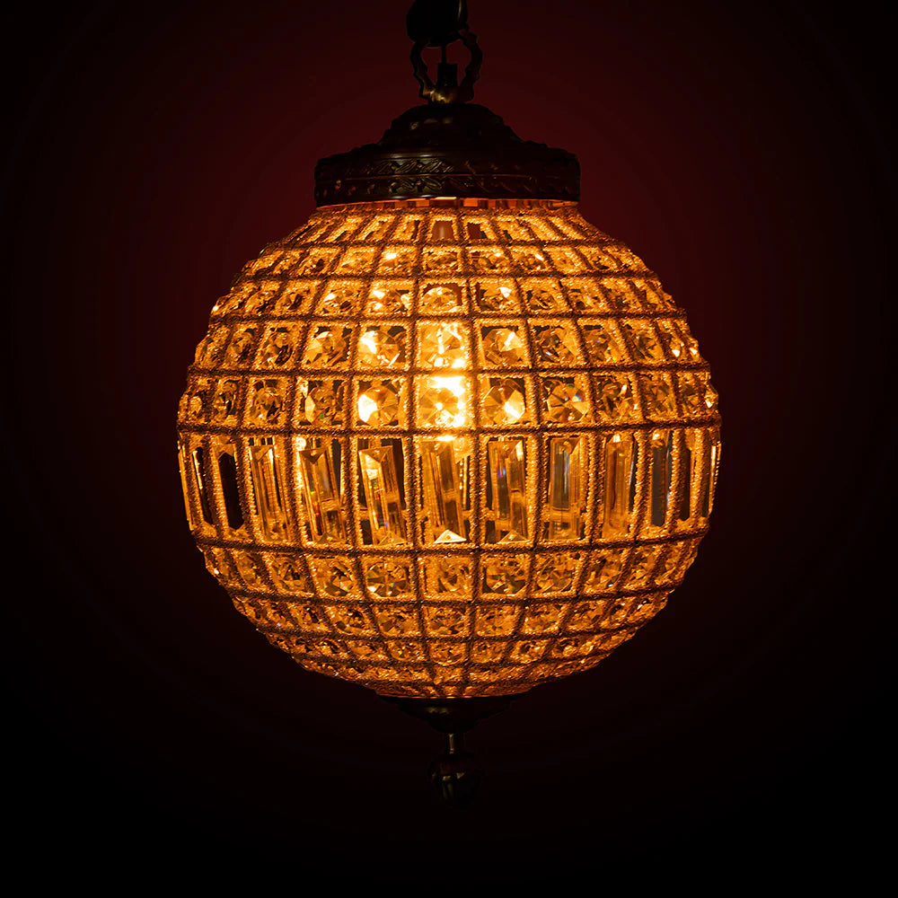  a handcrafted hanging lamp that radiates elegance and warmth. 