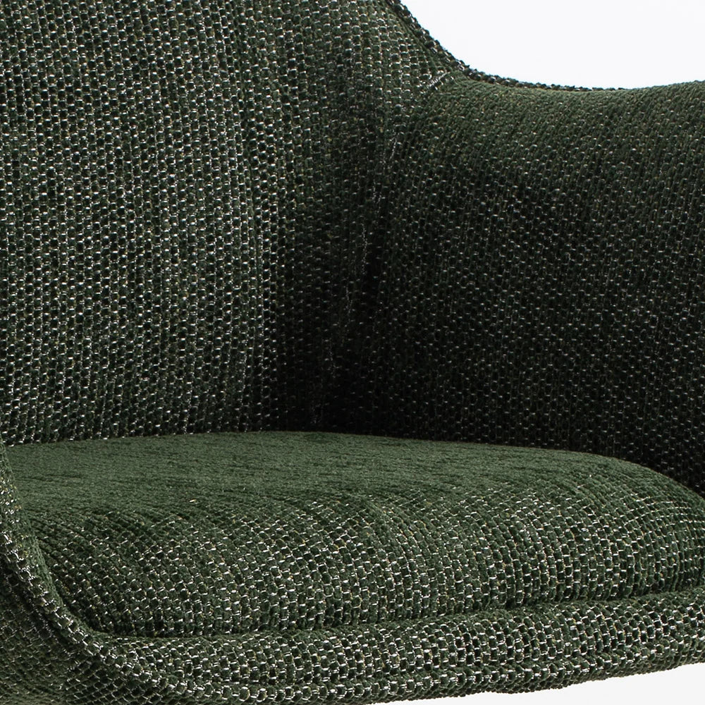 Close-up of a woven outdoor chair cushion in dark olive green, showing the textured fabric weave and curved armrest shape.
