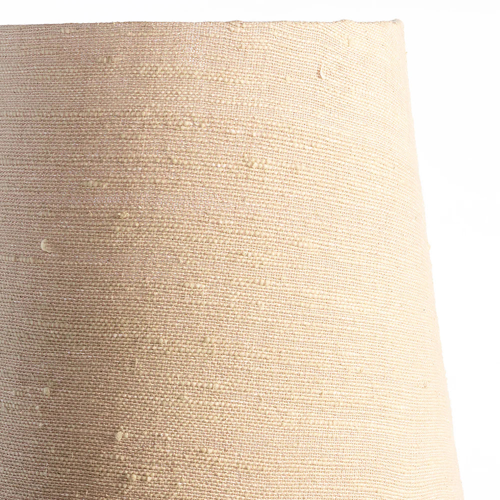 Close-up of a textured beige fabric surface