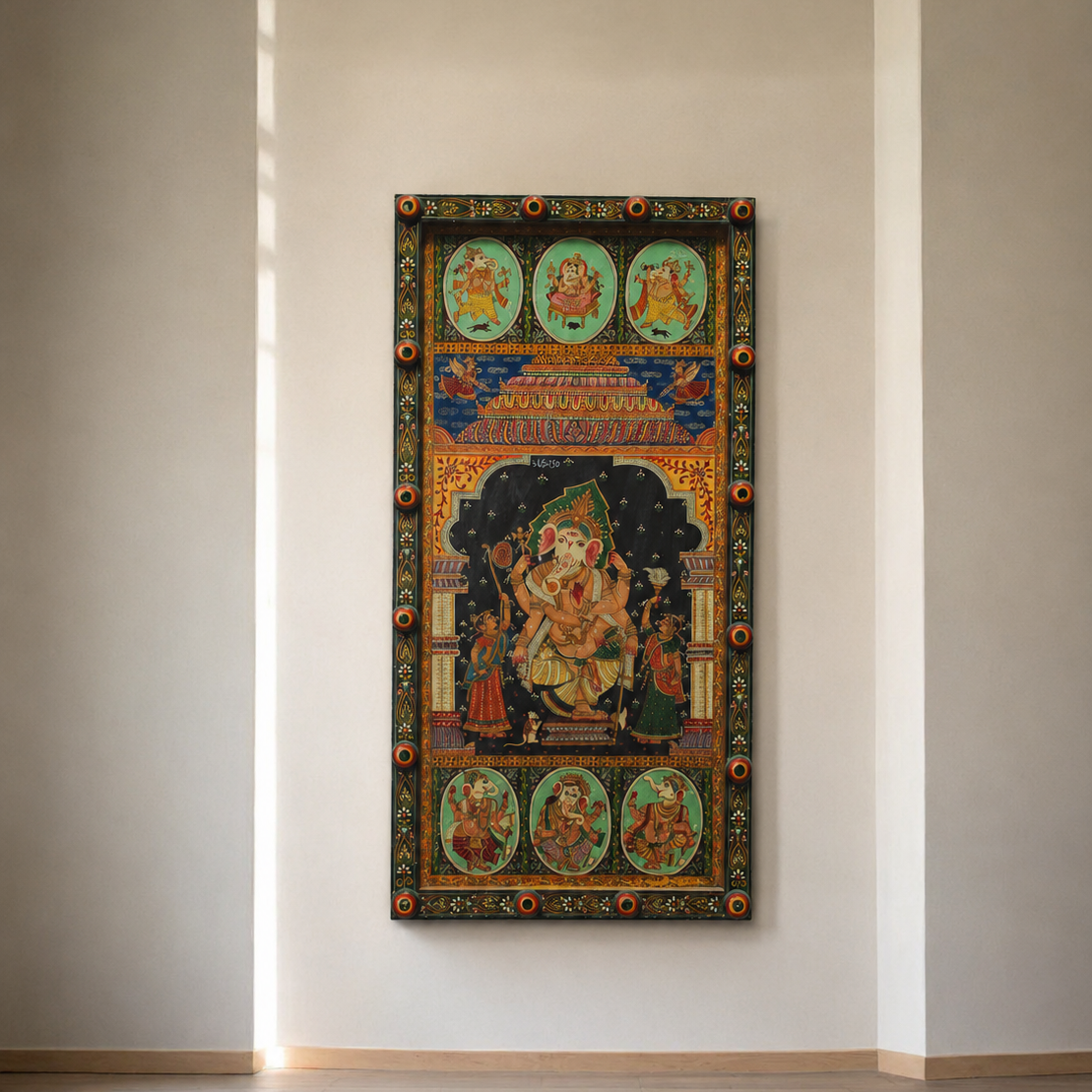 A vertical framed wall art piece featuring a traditional multicolored religious illustration, displayed on a minimalist beige wall above light wood flooring.