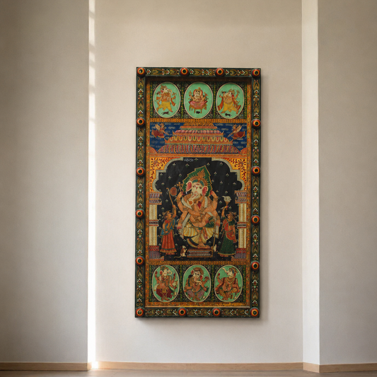 A vertical framed wall art piece featuring a traditional multicolored religious illustration, displayed on a minimalist beige wall above light wood flooring.
