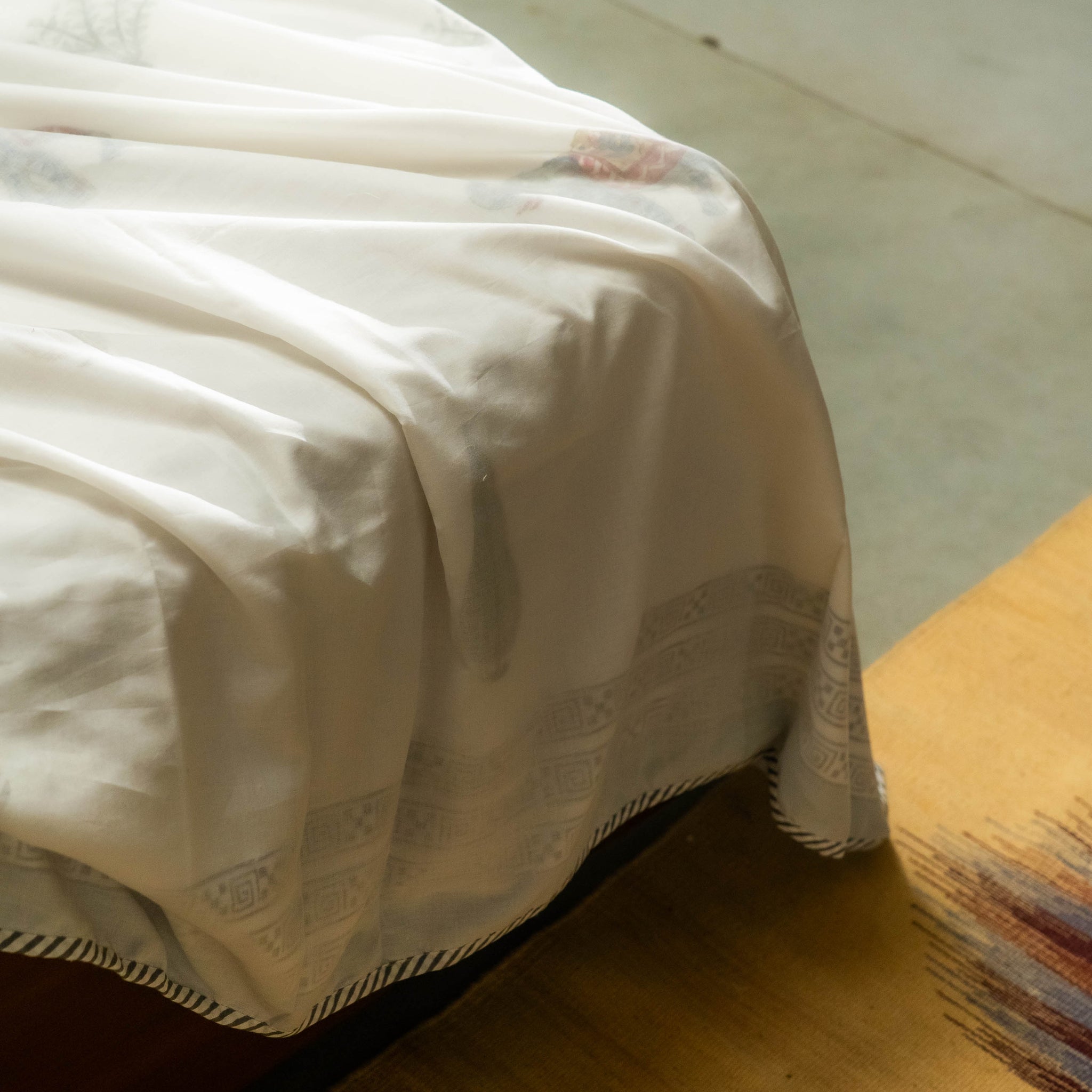 Our Raj Gaj Dohar made of soft organic cotton is hand block printed with cheerful motifs. 