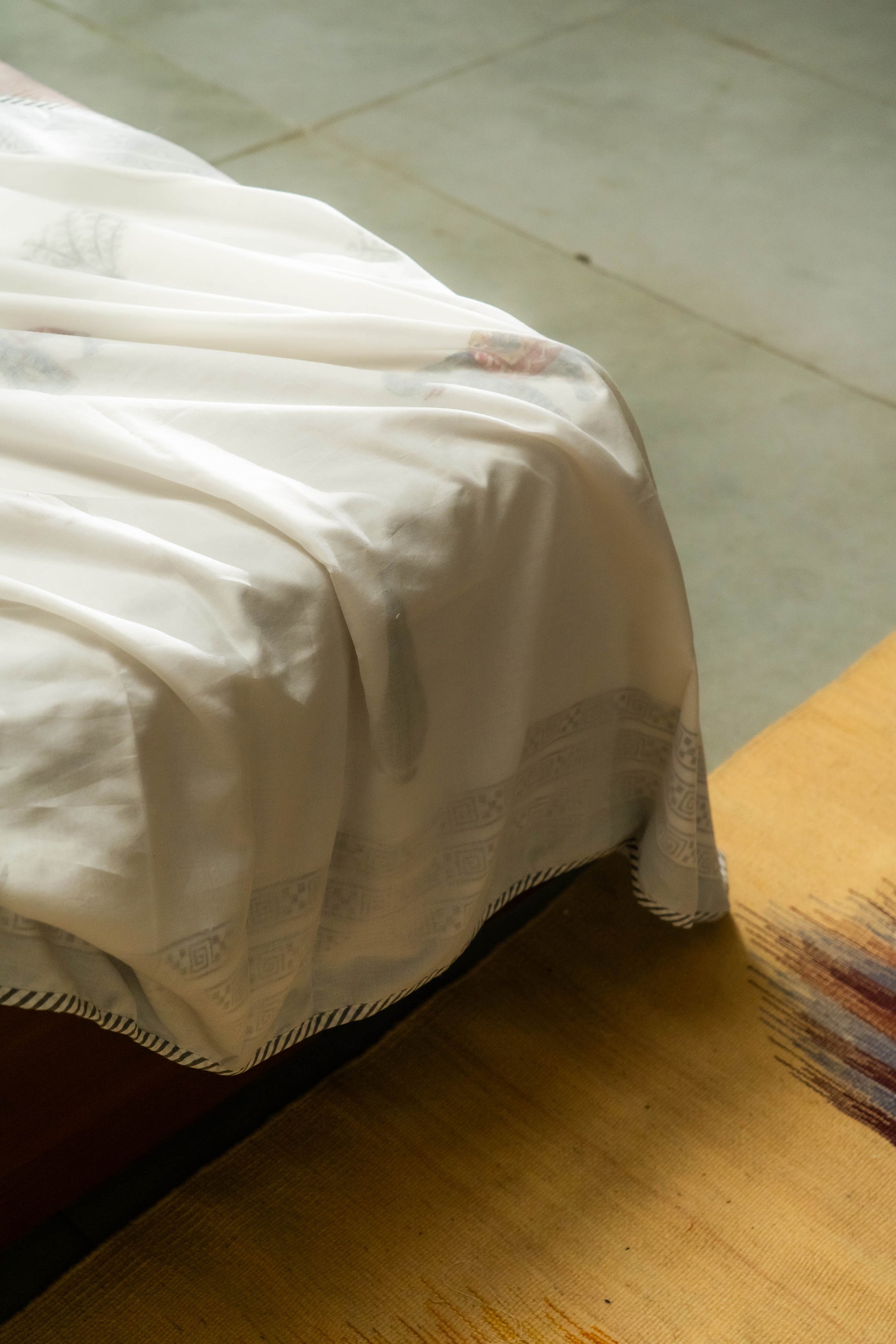 Our Raj Gaj Dohar made of soft organic cotton is hand block printed with cheerful motifs. 