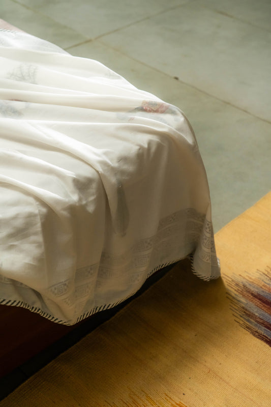 Our Raj Gaj Dohar made of soft organic cotton is hand block printed with cheerful motifs. 