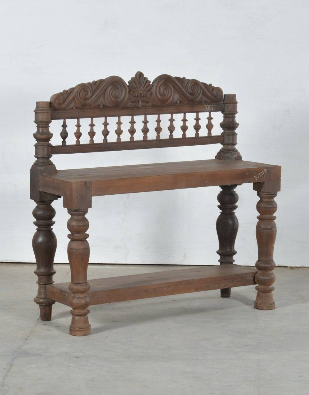 Its refined silhouette and naturally rich wood grain evoke the charm of heirloom furniture, making it a statement piece that blends effortlessly into both classic and contemporary interiors.