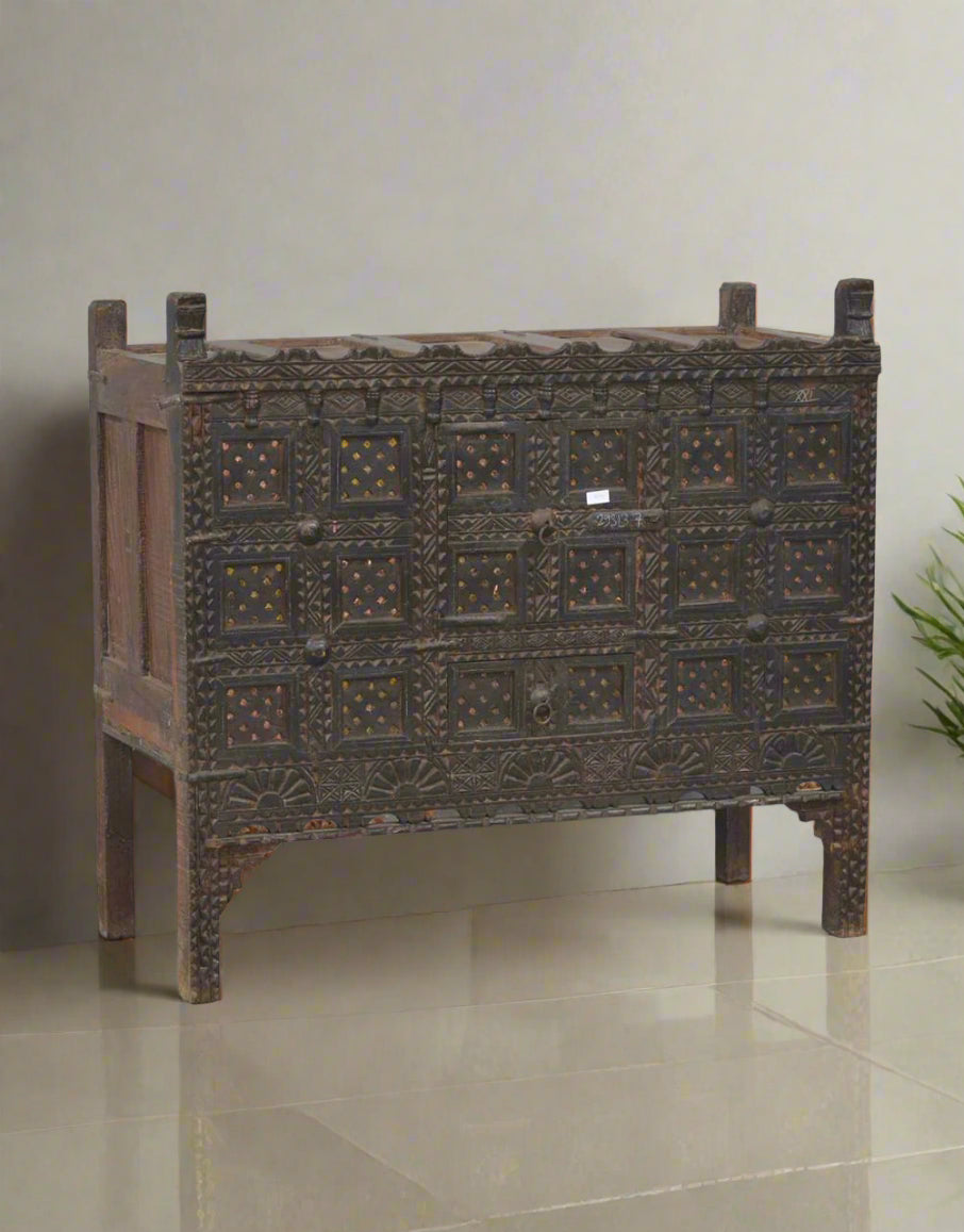 Gracefully echoing royal charm, the Rajika Damachiya&nbsp;is a vintage wooden chest that blends intricate detailing with rustic elegance. The name Rajika, meaning "radiant" or "royal," perfectly captures its essence—bold, beautiful, and timeless. 