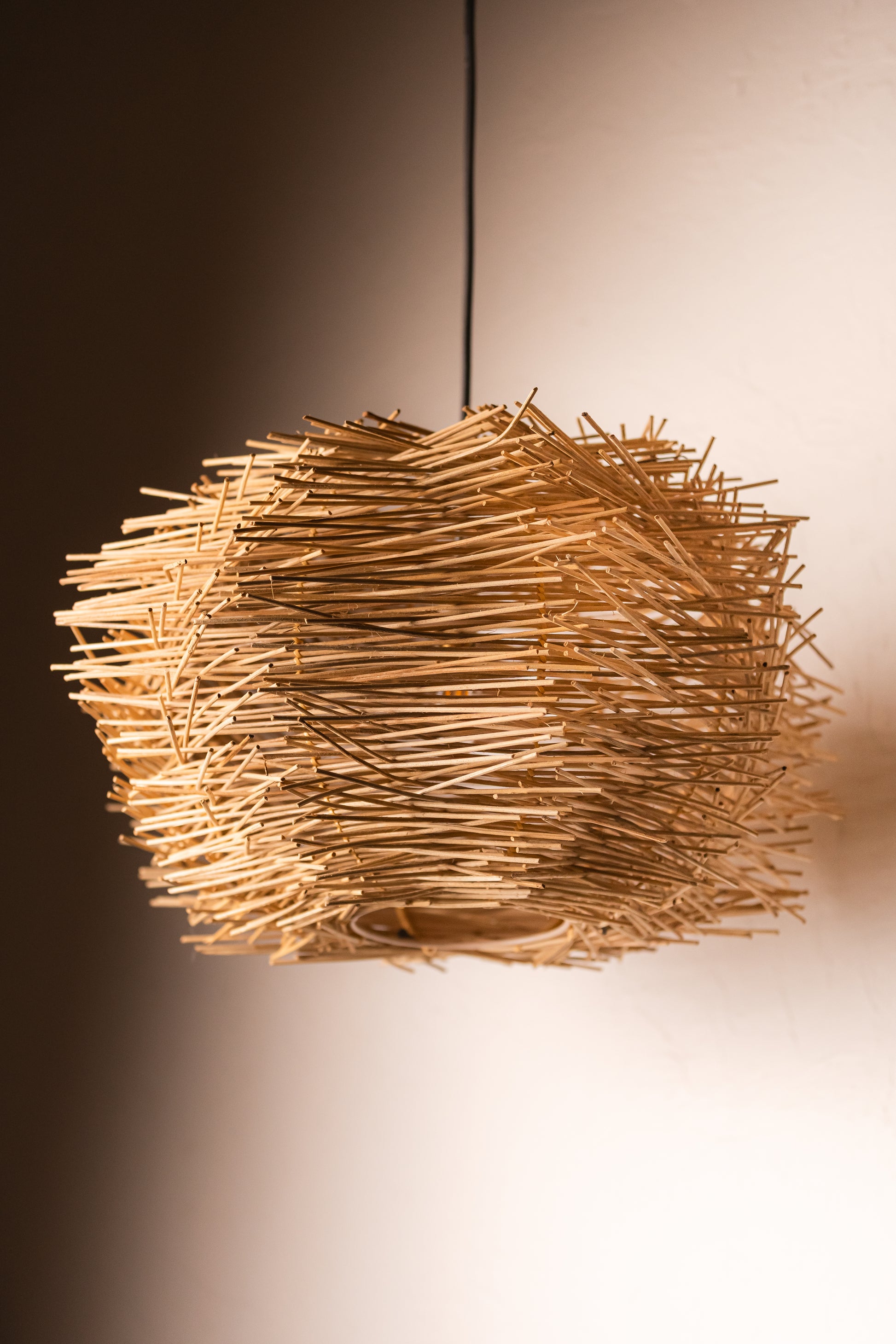 RATTAN ABSTRACT PENDANT LAMPSHADE  Abstract pendant lampshade, Artisan-made lampshade, Bedroom lighting solution, Bohemian pendant light, Child's room art, Coastal home décor, Covered patio lighting, Expertly crafted pendant, Handcrafted rattan pendant, Living space lighting, Quality rattan lighting, Rattan abstract pendant, Rustic pendant fixture, Versatile ceiling light, TESU