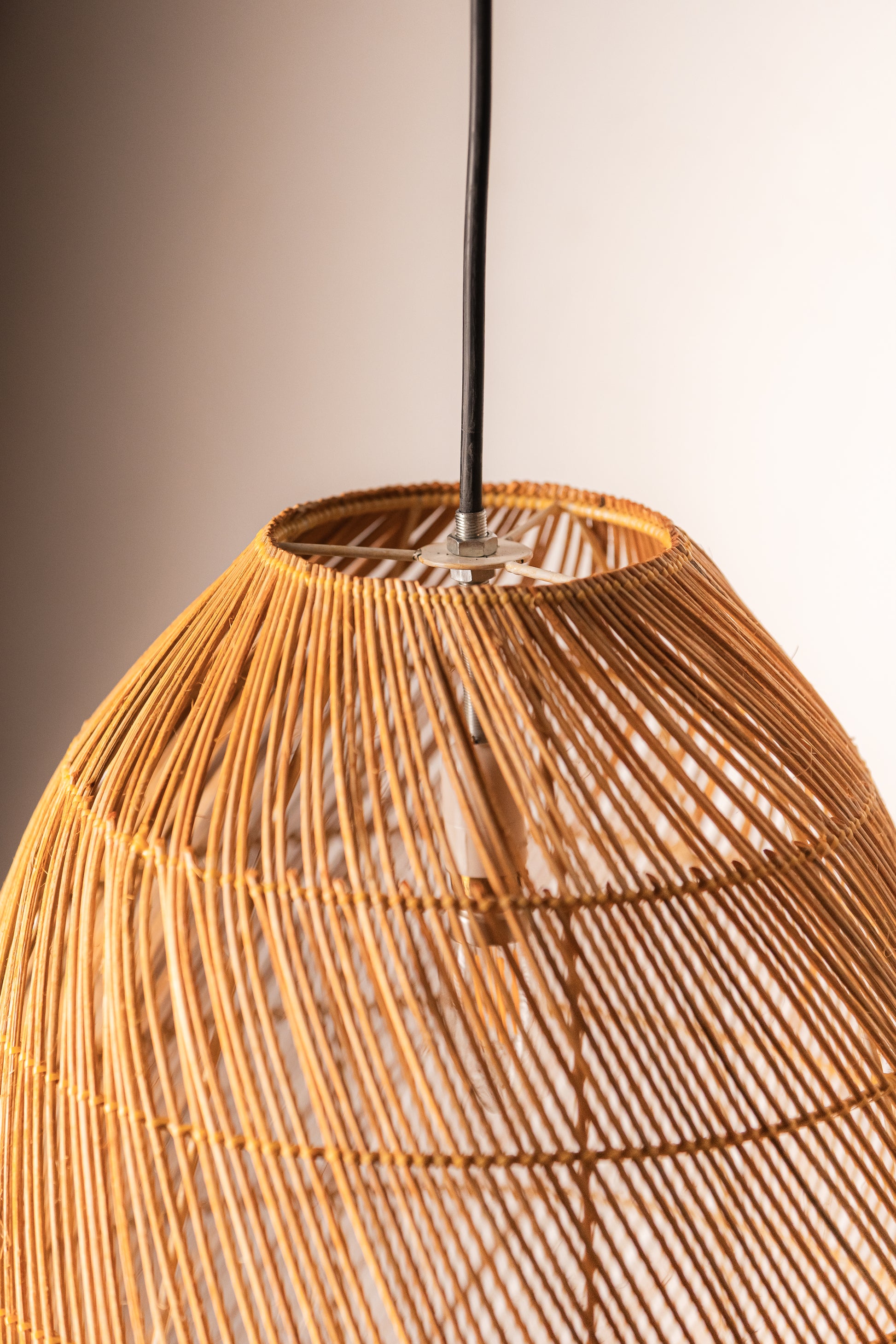 Rattan Pendant Drop Shaped Lampshade. A beautifully handcrafted rattan pendant that looks amazing in a bedroom, child's room, living space or covered patio . It is expertly crafted and hand finished to perfection ensuring quality. This rattan pendant light is a great way to add bohemian charm and warmth to your home and is perfectly adaptable to any ceiling height from your bedroom TESU