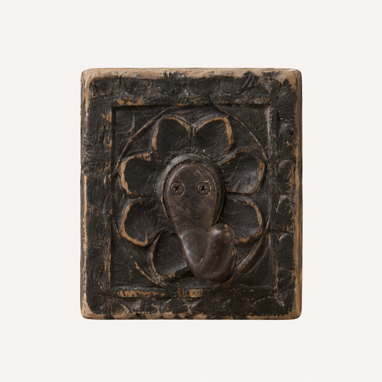 A square dark brown carved wooden wall hook with a floral relief design, shown against a plain off-white background.