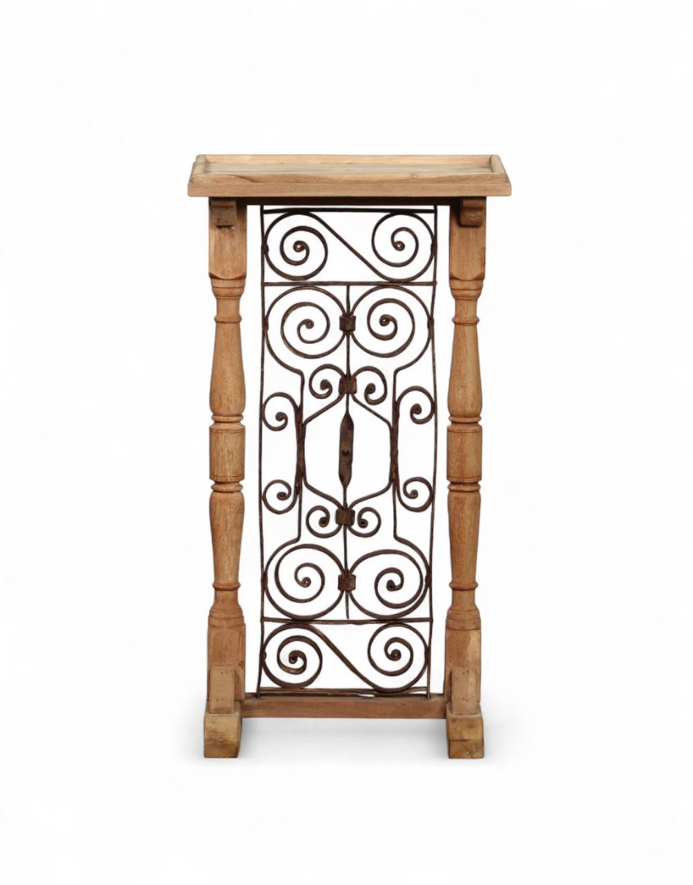 Wooden side table with decorative metal grille on a white background