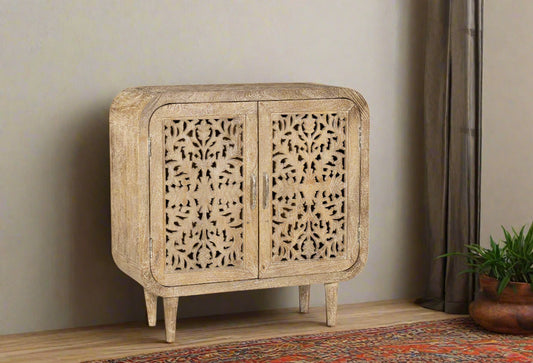 Bring timeless elegance and earthy charm to your space with the Sandal Bloom Cabinet. 