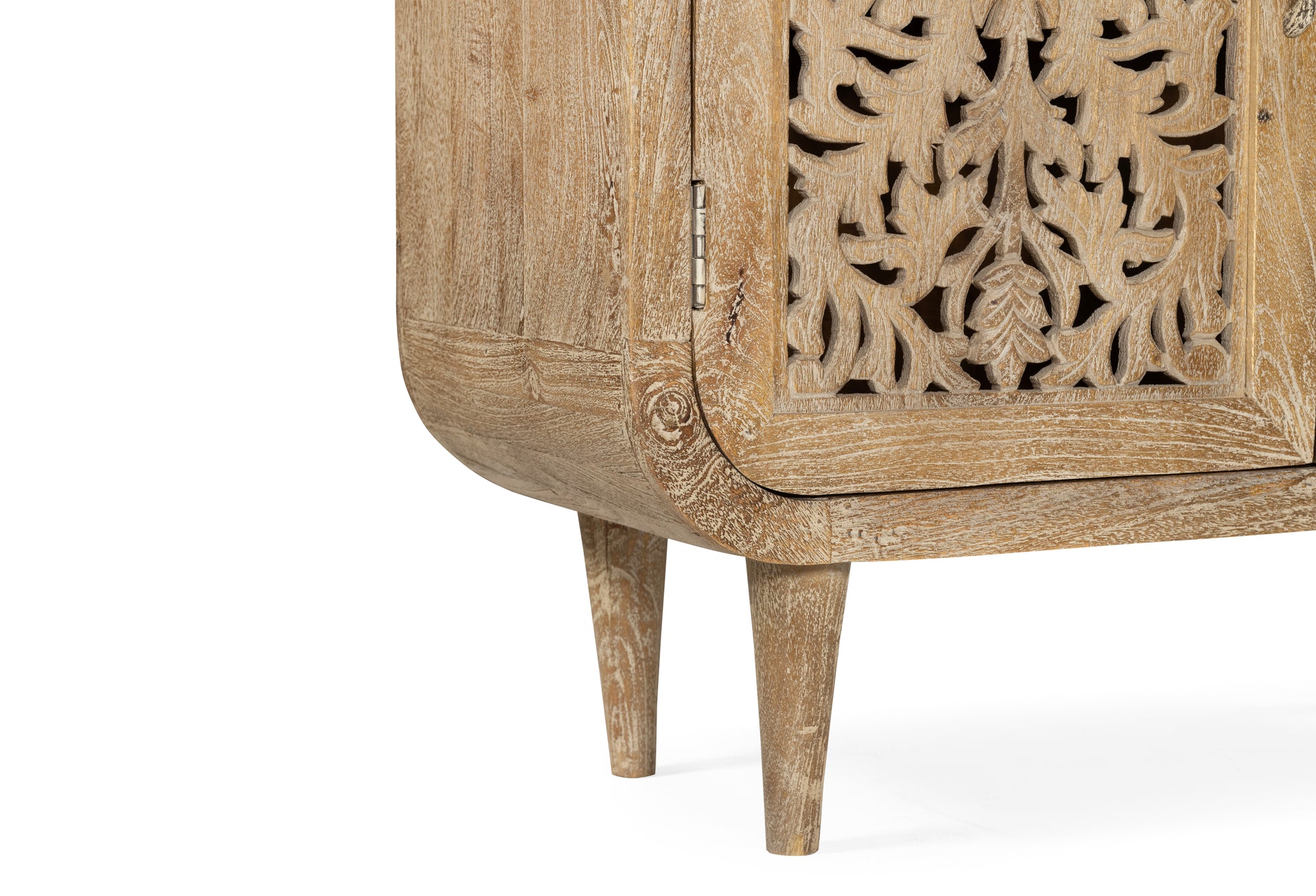 Wooden cabinet with intricate carvings on a white background