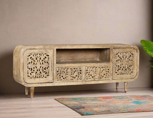  Expertly handcrafted from sustainable mango wood, this elegant console features intricately hand-carved floral motifs on each panel, 