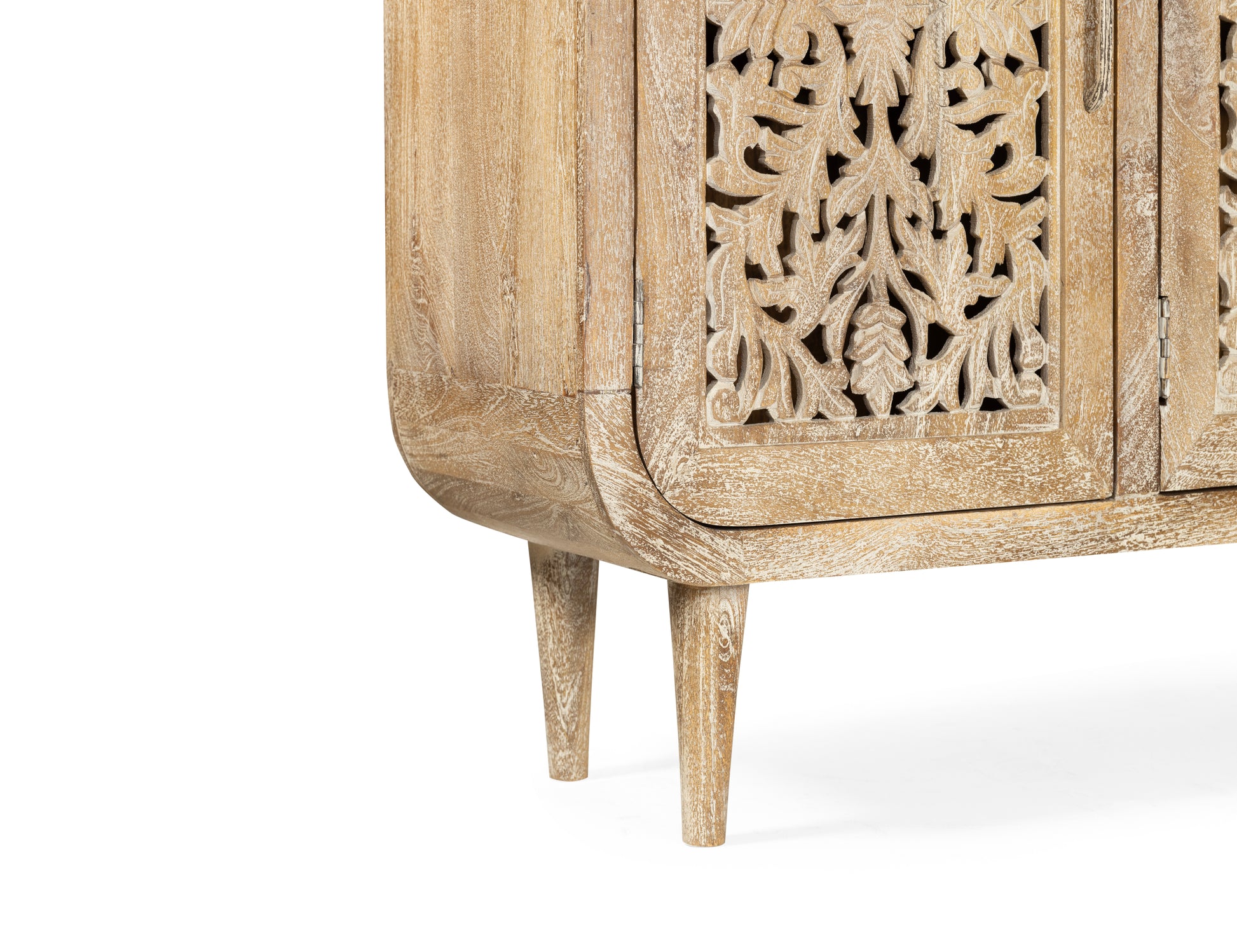 Wooden cabinet with intricate carvings on a white background