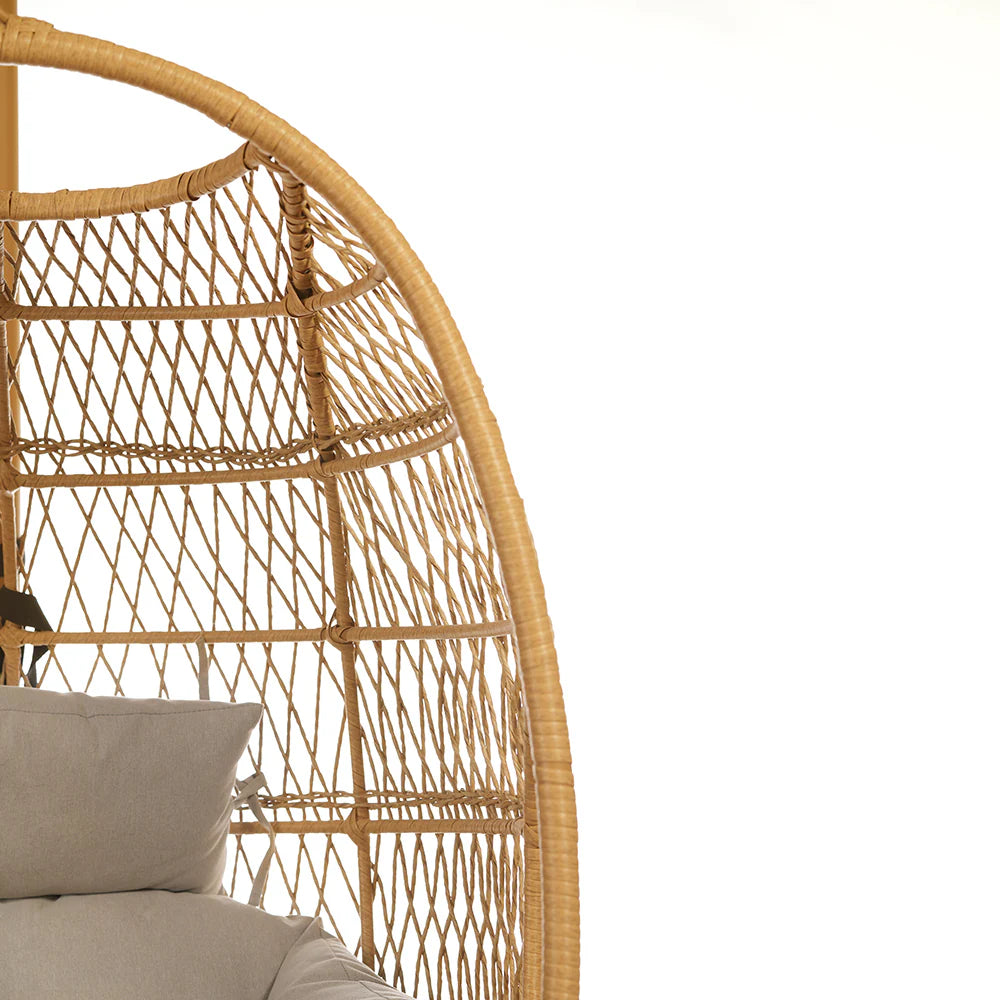 The Serene Cocon Rattan Chair Swing is a beautifully crafted piece designed to provide both comfort and style. Made from durable rattan, this chair swing offers a serene and inviting space for relaxation.